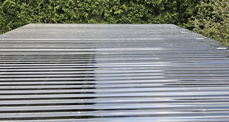 Evenly spaced timber slats forming an open shade roof, the spacing that sets how much sun comes through